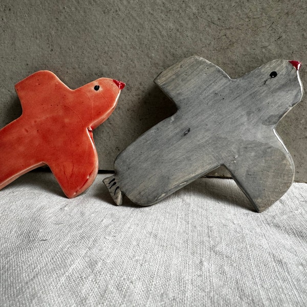 Handmade clay bird to hang on the wall