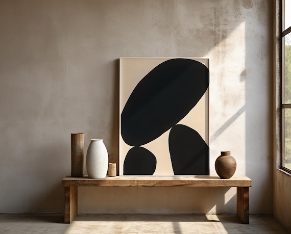 Bold Black Abstract with Soft Neutral Ground – Framed Poster