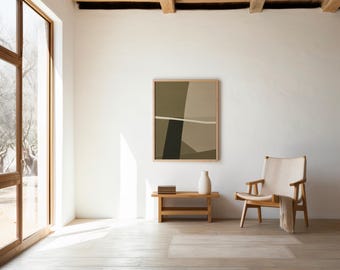 May include: A square framed wall art piece featuring abstract geometric shapes in shades of olive green, dark brown, and beige, intersected by a horizontal off-white line. The artwork is displayed on a plain white wall above a wooden bench.