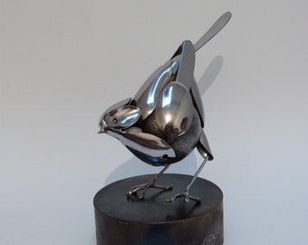 bird sculpture based on stainless steel cutlery