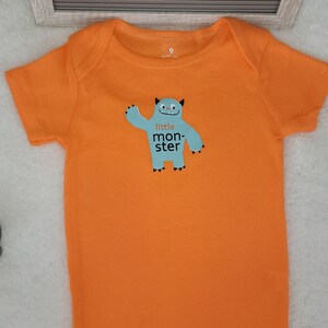 Monster Design Baby Onesie: Orange Cotton Bodysuit