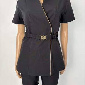 Luxurious healthcare professional tunic and trousers with embroidery, with an additional belt