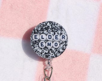 Elder Emo Bead Badge Reel: Black, White Glitter Resin