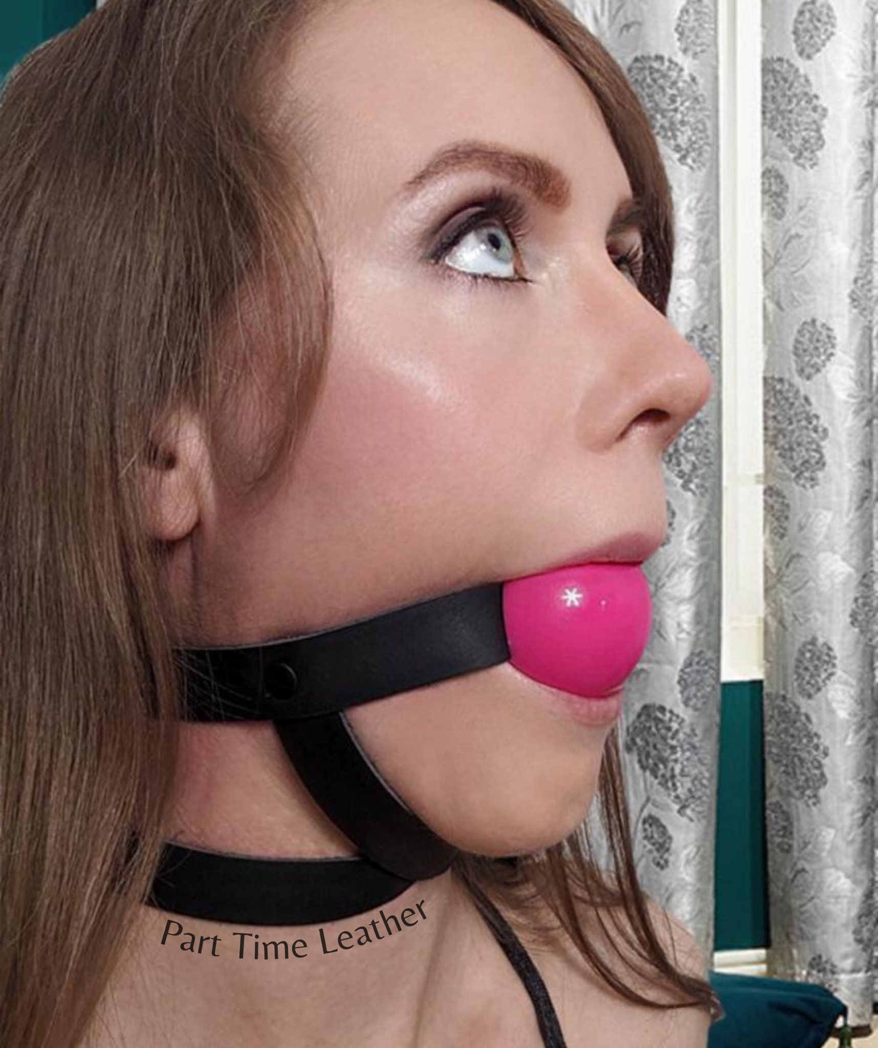 Ball gag selfie