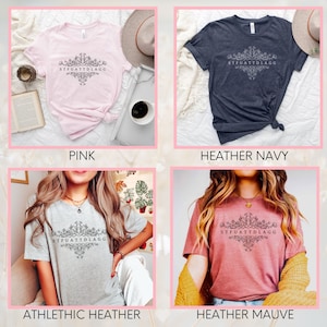 May include: Four t-shirts in different colours with a floral design and the text "STFUATTDLAGG" printed on the front. The colours are pink, heather navy, athletic heather, and heather mauve.