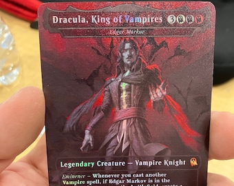 May include: A black and red card with a vampire illustration. The card is titled "Dracula, King of Vampires" and has a power and toughness of 4/4. The card text reads "Eminence - Whenever you cast another Vampire spell, if Edgar Markov is in the command zone or on the battlefield, create a 1/1 black Vampire creature token. First strike, haste. Whenever Edgar Markov attacks, put a +1/+1 counter on each Vampire you control."