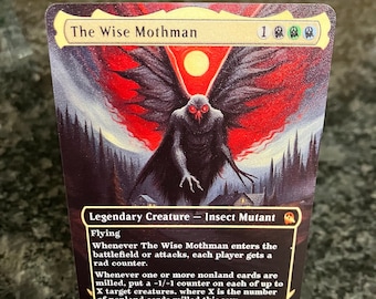 May include: A fantasy trading card featuring a creature called "The Wise Mothman". The card is illustrated with a dark, winged creature with glowing red eyes against a backdrop of a red and black sky. The card text describes the creature's abilities and stats.