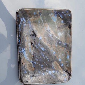 Blauwe bronzen plaat