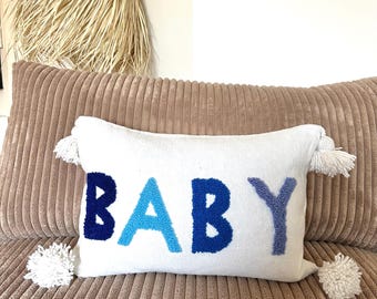 Housse de coussin en coton blanc à pompons 60x40 bi matière "Baby" bleu