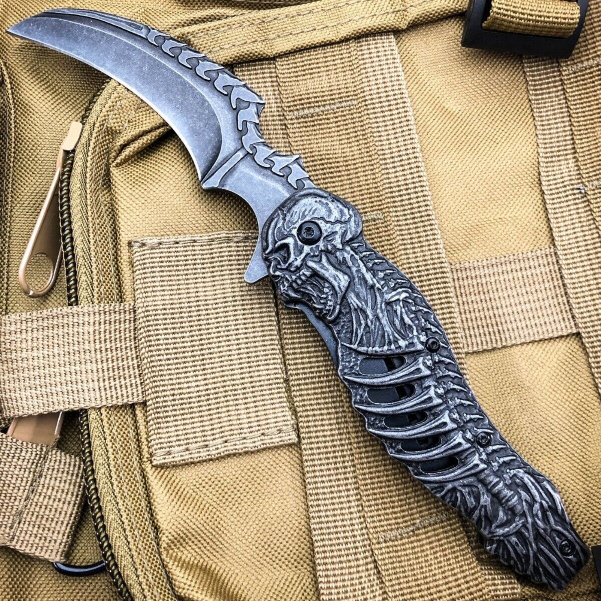 8.25 TAC FORCE SKULLS SPRING ASSISTED TACTICAL FOLDING KNIFE