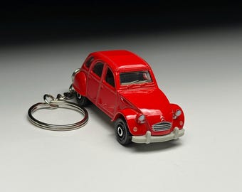 Llavero vintage de coche rojo de 1970 Hot Wheels Matchbox
