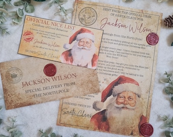 May include: A vintage-style certificate of good behavior from Santa Claus for Jackson Wilson. The certificate is decorated with a red wax seal and a watercolor illustration of Santa Claus. The text reads "Official Nice List Certificate of Good Behaviour In honour of your exceptionally good behaviour all year round, I, Santa Claus, hereby place you Jackson Wilson on the official nice list for 2023 SIGNED: Santa Claus".