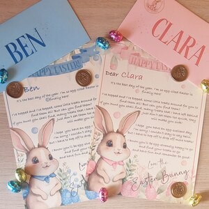 May include: Two pastel envelopes with bunny illustrations and the words "Happy Easter" on them. The envelopes are addressed to "Ben" and "Clara" with a gold wax seal on each. The text inside the envelopes reads "It's the best day of the year. I'm so egg-cited Easter is finally here! I've hopped and I've bopped, some little treats around for you to find them all! But can you find them? If you hunt you shall find, many treats that I have left behind. Just don't eat them too quick, they will make you sick! I hope you have an egg-cellent day. I'm sorry I couldn't stay to say hello, but I have to hop off to drop off more treats! I know you'll be egg-stremely happy to go and find your treats so go and have fun and remember be good! Love the Easter Bunny"