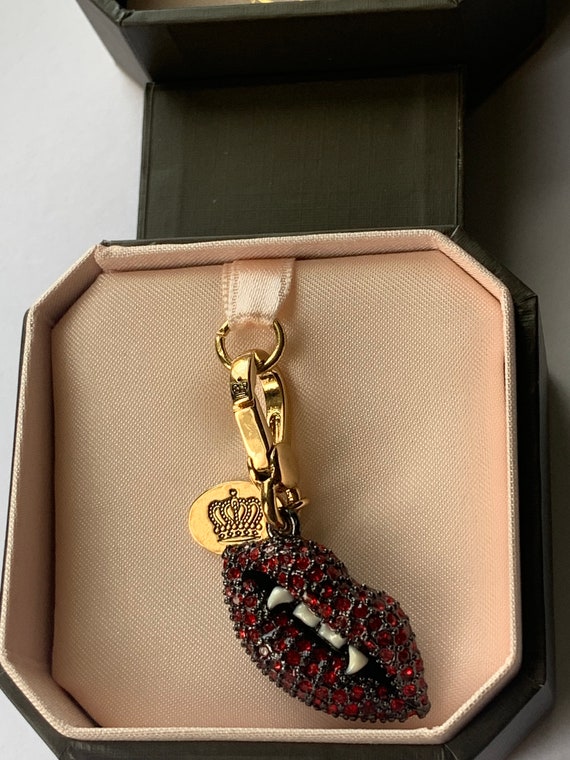 Juicy Couture charm bracelet featuring a crystal - Depop