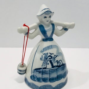 Vintage from 1950’s White and Blue Dutch Girl Figurine Hauling Water Basket 4.5”