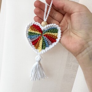 Crochet hearts. Hang them on gifts, make keychains. Use as washable and reusable face scrubbies. Make a garland, use as car charms, bag charm. The perfect and quick handmade valentine gift. Pride heart, crochet pride, pride gift, love. Animo design