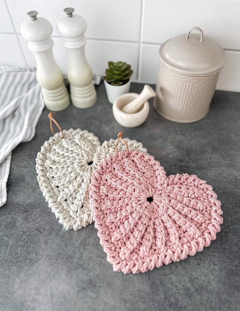 Crochet hearts. Use a bigger crochet hook and macramé rope and make pot holders instead. The perfect and quick handmade valentine gift.  Heart, elegant, classic, kitchen crochet, crochet interior, heart trivet, simple design. Love. Animo design