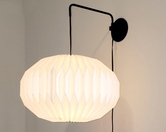 Industrial black metal sconce with elliptical paper lampshade, modern  pleate wall light, bedside sconce, oval sconce, swing arm wall lamp.