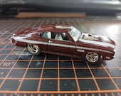 Hot Wheels 1970 Buick GSX Muscle Car Toy With Cragar-Style Mag Wheels and Rubber Tires