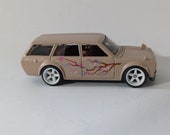 Hot Wheels 1971 Datsun 510 Station Wagon With Custom Wheels and Real Rubber Tires