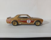 Nissan Skyline GT-R Toy Car by Hot Wheels With Gold Custom Wheels and Rubber Tires