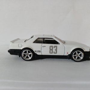 Toy Nissan Skyline GT-R R30 Car by Hot Wheels, With Custom Wheels and Tires