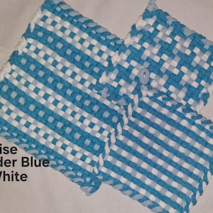May include: Three square woven potholders featuring a checkered pattern in turquoise, powder blue, and white. The text "Turquoise Powder Blue White" is printed on the left side. Each potholder has a thick, looped texture with a braided border.
