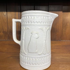Antique stoneware pitcher #321 by RRP Co Roseville, Ohio.
