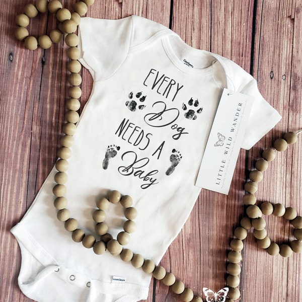 Dog Baby Announcement Onesie ®, Every Dog Needs A Baby Bodysuit, New Daddy Gift, New Grandparent Surprise, Dog Sibling Tee Parent Shirt