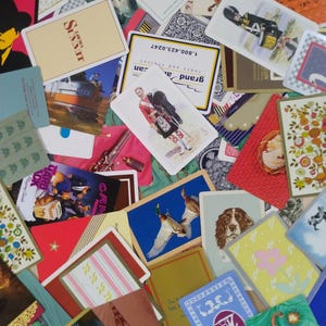 a large variety of different vintage playing cards