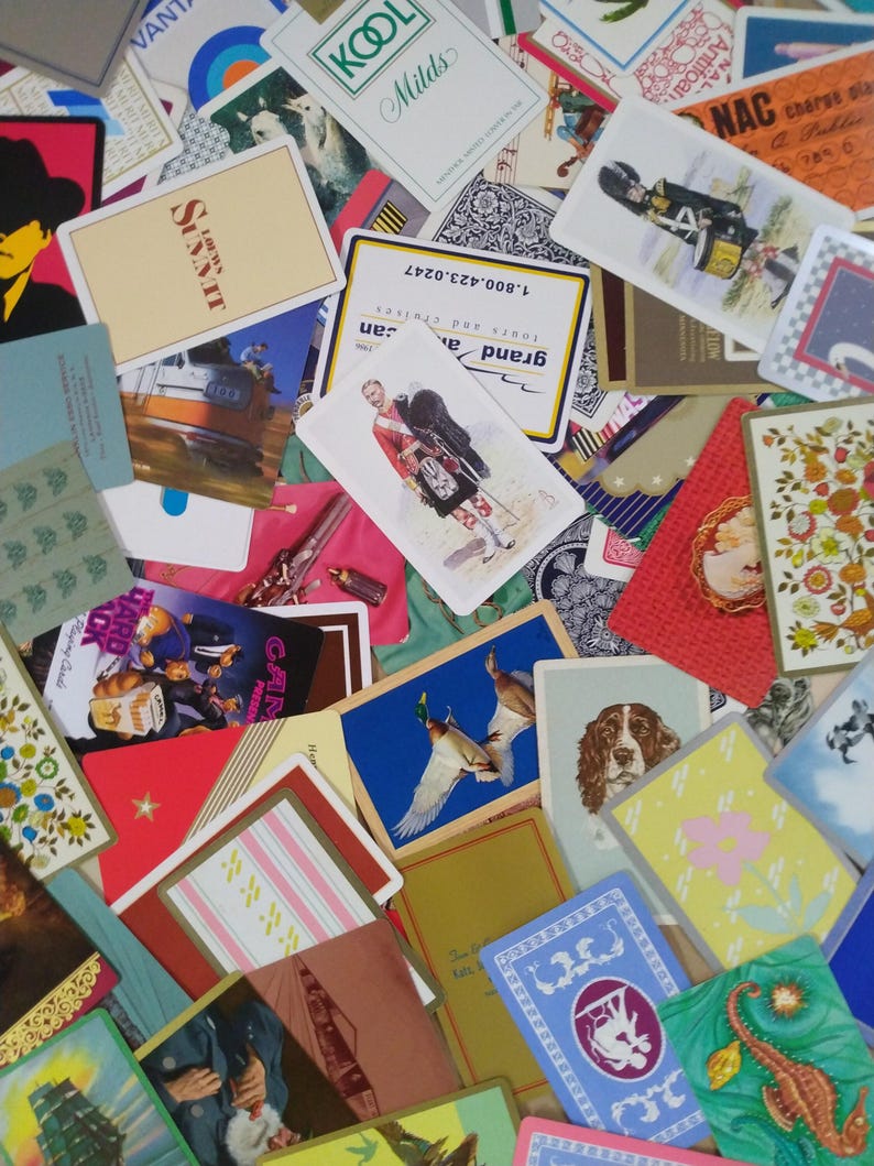 a large variety of different vintage playing cards
