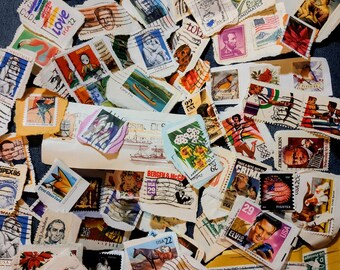Assortiment de timbres-poste américains d'occasion sur papier : artisanat et collage