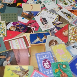 a large amount of different vintage playing cards
