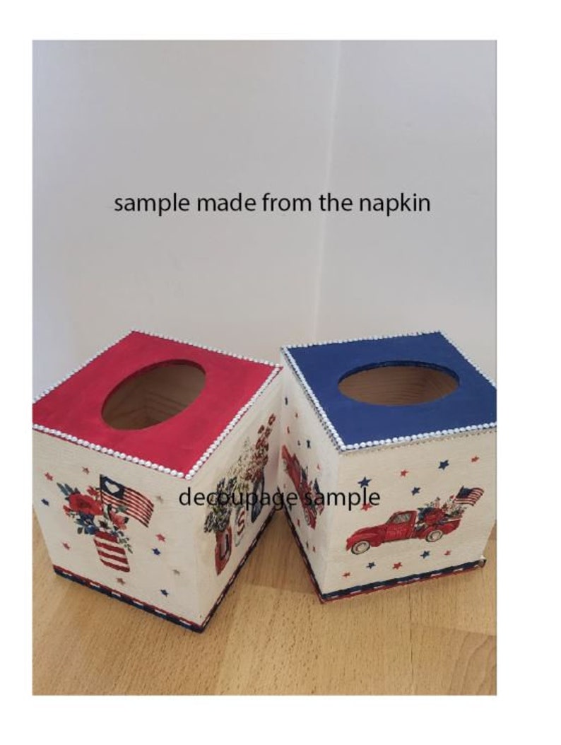May include: Two tissue box covers, one red and one blue, with a patriotic design featuring stars, a red truck, and the words "Decoupage Sample".