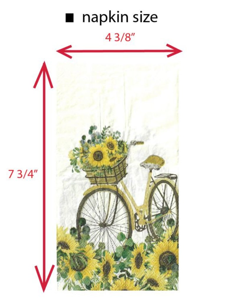 Puede incluir: Una servilleta de papel blanca con una ilustraci&oacute;n vintage de una bicicleta que lleva una cesta de girasoles. La servilleta mide 4 3/8 pulgadas por 7 3/4 pulgadas.