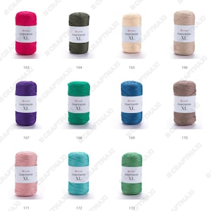 May include: Twelve spools of macrame cord in various colors, including pink, green, blue, brown, and beige. Each spool is labeled "macrame XL".