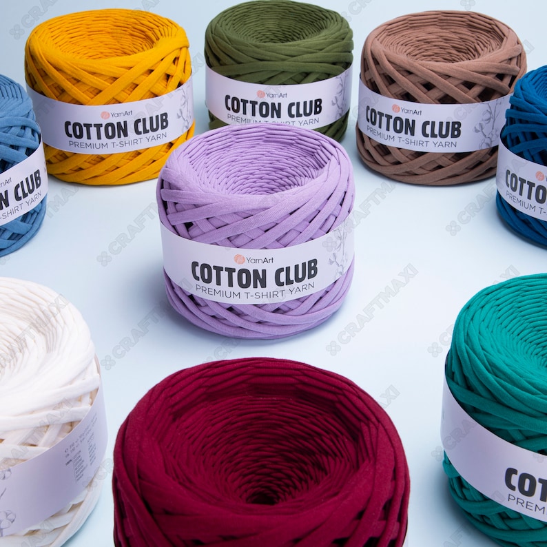 May include: Assortment of colorful cotton yarn balls, each with a white label that reads "YarnArt Cotton Club Premium T-Shirt Yarn".