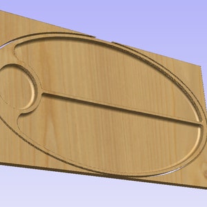 May include: A wooden tray with a large oval cutout and a smaller circular cutout. The tray is made of light brown wood and has a smooth finish.