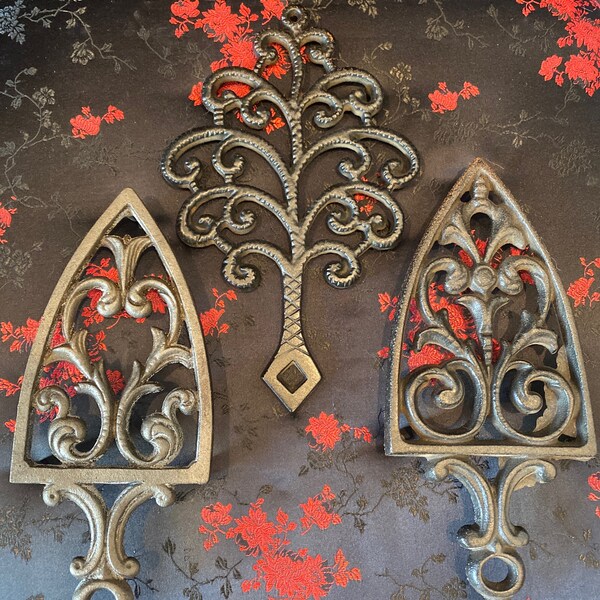 Vintage Cast Iron Black Trivets. Tree of Life and Cathedral scroll. Sold separately.