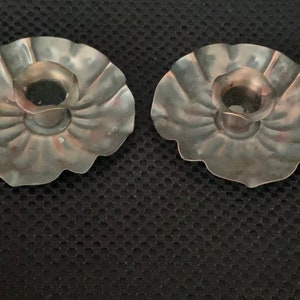 Vintage primitive pair copper hammered candlestick holders. Made in the USA by Gregorian marked. Sold as pair!
