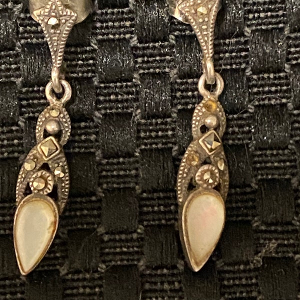 Vintage Art Deco style marcasite and moonstone dangle earrings in sterling silver.