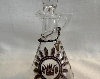 Vintage Hazel Atlas glass cruet Georges Briard with 22k gold regalia pattern.