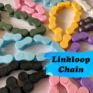 May include: A selection of multi-coloured Linkloop Chains in shades of pink, green, blue, yellow, purple, black, and white. The chains are arranged in a random pattern, with the text "Linkloop Chain" on a blue splash.