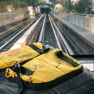 Bag to Life Cargo Backpack made from upcycled aircraft lifejackets image 2