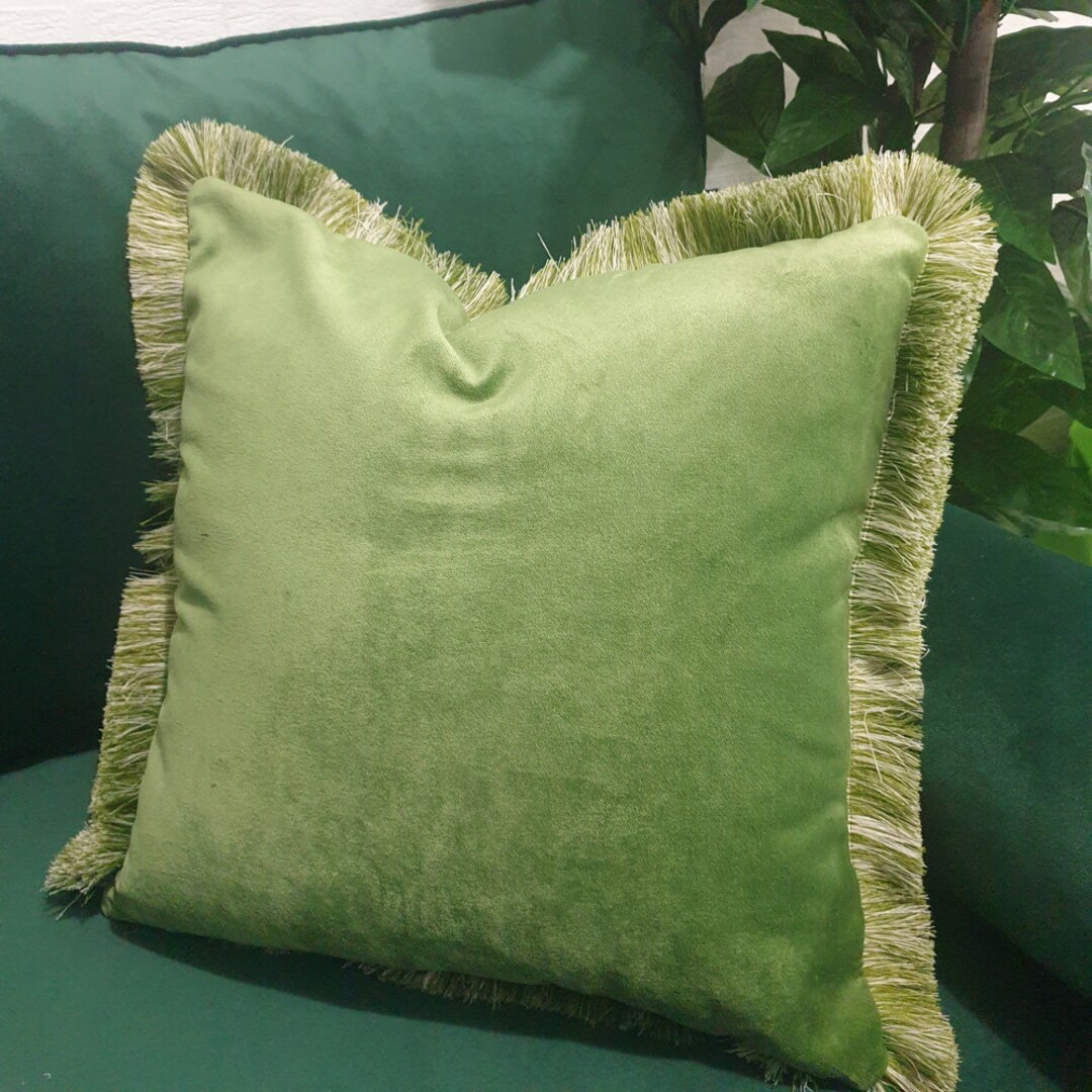 Add a Pop of Color and Texture to Your Modern Sofa With a Light Green