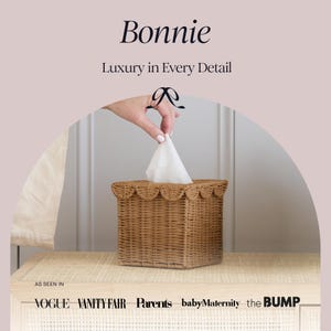 May include: A woven wicker tissue box with a scalloped edge, holding a white tissue. The text "Bonnie" and "Luxury in Every Detail" are displayed at the top. The brands "Vogue", "Vanity Fair", "Parents", "babyMaternity", and "the BUMP" are also shown.