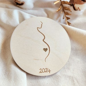 Carte annonce de grossesse en bois avec pochette en tissu et message personnalisable
