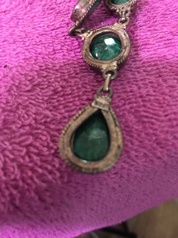 Sterling silver necklace with emerald colored ston