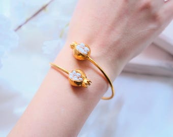 Pulsera de granada: joyería turca hecha a mano con oro de 18 quilates y perlas.