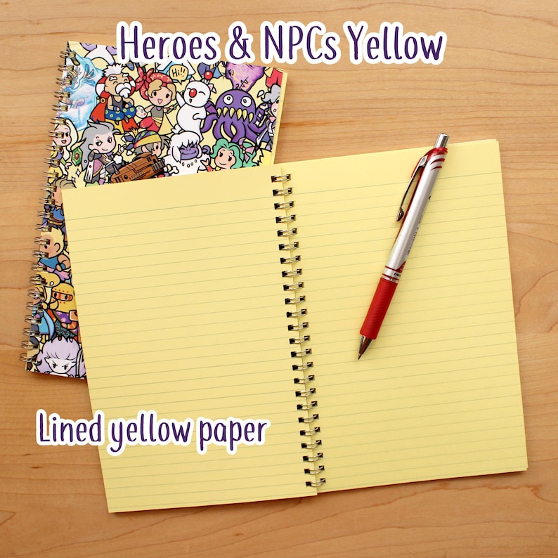 May include: A spiral-bound notebook with a colorful cover featuring cartoon characters, and the text "Heroes & NPCs Yellow." The notebook is open to reveal lined yellow paper, with a red and silver pen resting on the page. The text "Lined yellow paper" is also visible.